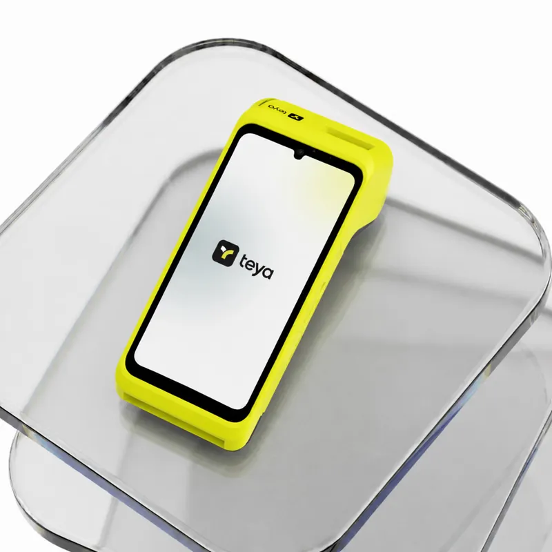 Teya Pro on a glass slab in a studio, screen showing the Teya logo.
